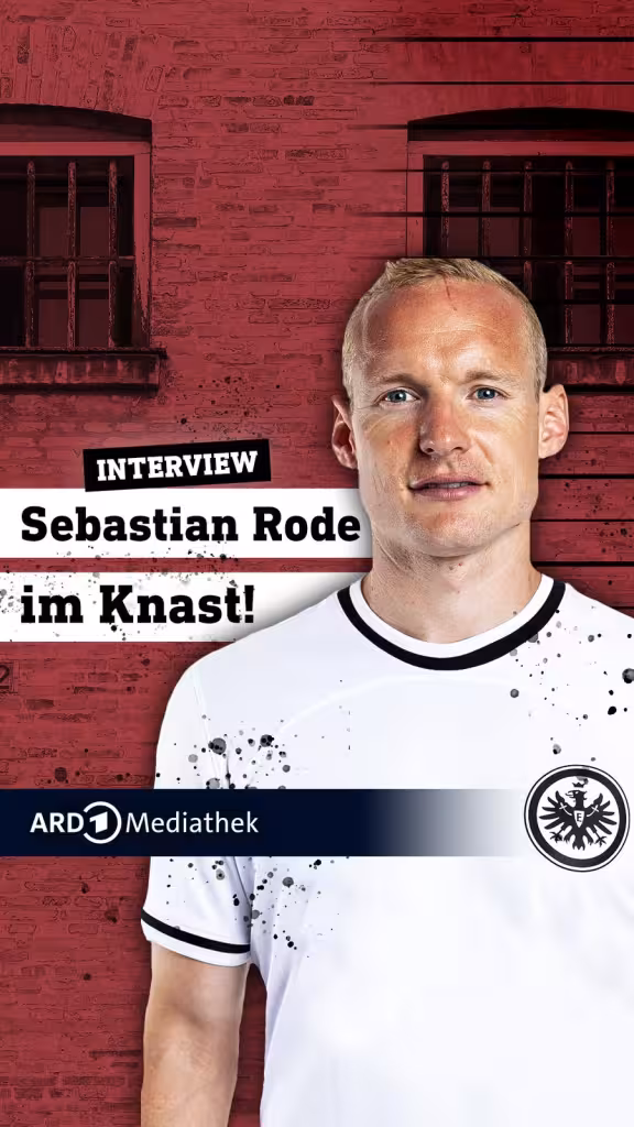Titelbild „Sebastian Rode im Knast“: Sebastian Rode im Eintracht-Trikot vor einer Backsteinwand